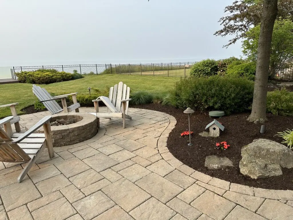 Lake Erie backyard with custom fire pit and paver patio