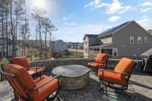 Outdoor fire pit in the backyard of a home