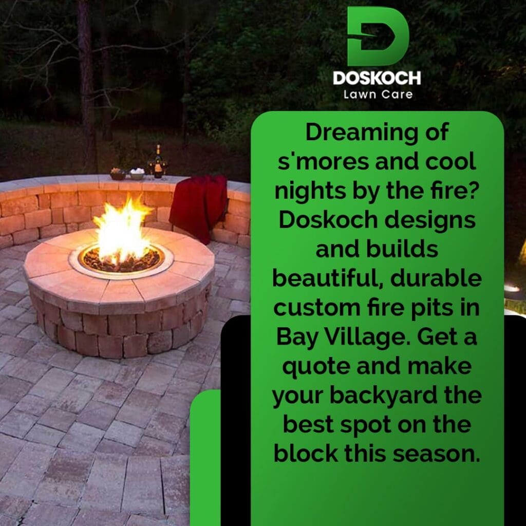 An advertisement for Doskoch Lawn Care showing a beautifully lit custom stone fire pit with a fire burning, set in a paved patio with s'mores ingredients nearby. The text promotes custom fire pits in Bay Village.