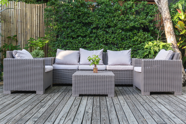 Patio furniture with cushions.